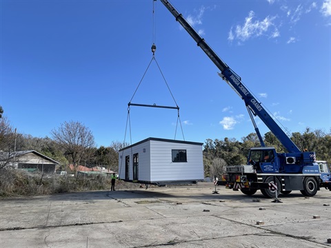 Batlow Caravan Park upgrade - units being craned in